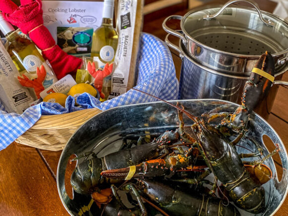 Lobster or scallop dinner with local NS white wine; baguette, butter & a lemon